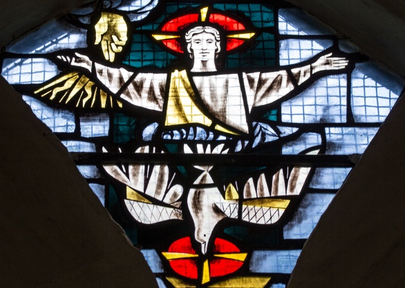 Detail from a stained glass by Harry Stammers installed in 1961 in the Blacader chapel of St Mungo's Cathedral, Glasgow.