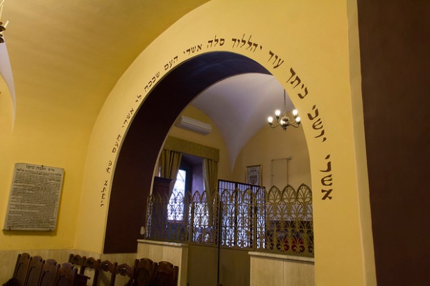 The Jewish Museum of Rome is beneath the Great Synagogue. The Spanish Synagogue has been moved here from a building that was just over the river but no longer exists. This is the ladies' gallery (as in all orthodox synagogues men and women sit separately). The Hebrew inscription (reading right to left) is the opening of psalm 145: "Happy are they who dwell in yoiur house and they shall praise You forever."